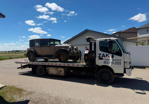 Zak Towing provides reliable flatbed towing and vehicle transport in Calgary, safely moving classic cars and other vehicles with secure equipment.