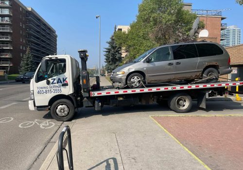 Zak Towing offers reliable flatbed towing in Calgary for damaged cars, minivans, SUVs, and other vehicles, with secure equipment for safe transportation.