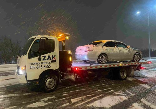 Zak Towing truck providing late night towing service in Calgary